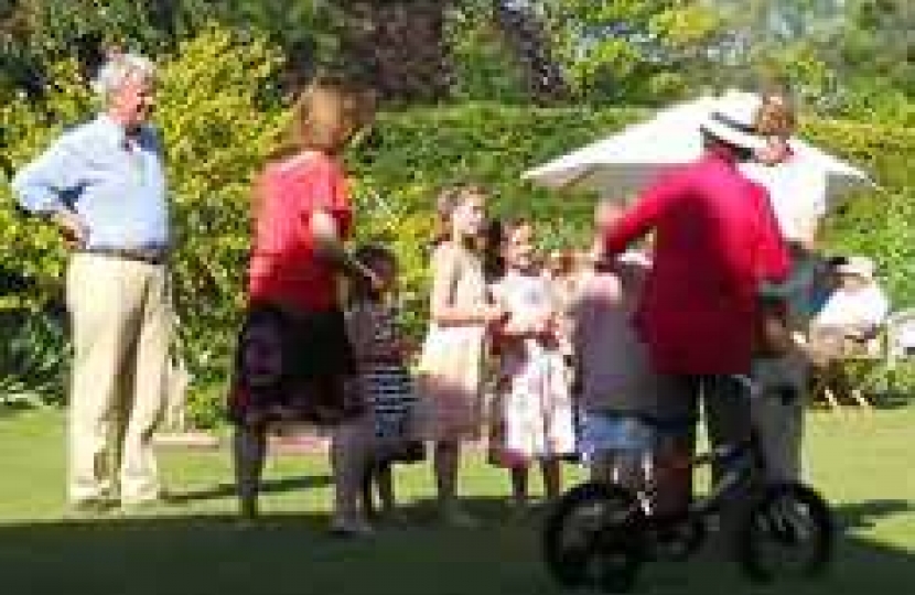 The children helping pick the raffle tickets.