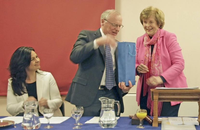 4. SCCA's AGM, 10 February 2017: Bill Potter, outgoing Chairman, receiving a gift of appreciation for four years' invaluable service from Dorothy Calder, SCCA President.