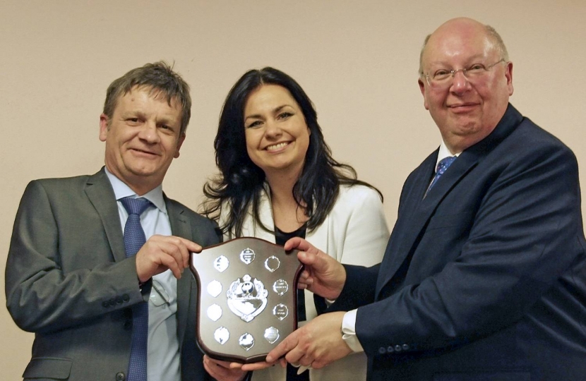 7. SCCA's AGM, 10 February 2017: Kevin Cuffley (left) and David Bard, Sawston Branch, with Heidi Allen MP holding the Eynesbury Shield, awarded annually to the branch which raised the highest income.