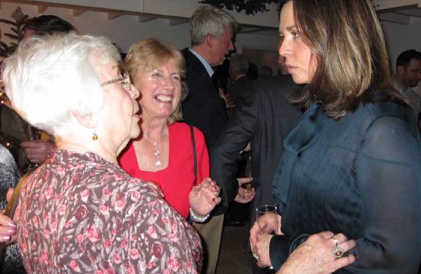 Iris Lay and Maureen Johnston talking with Sally Lansley.