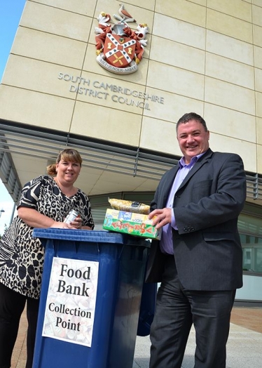 Cllr Mark Howell and Emma George at the new foodbank in SCDC's offices